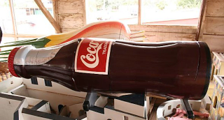Illustration for article titled Ghana's coffin art lets people bury their loved ones in style